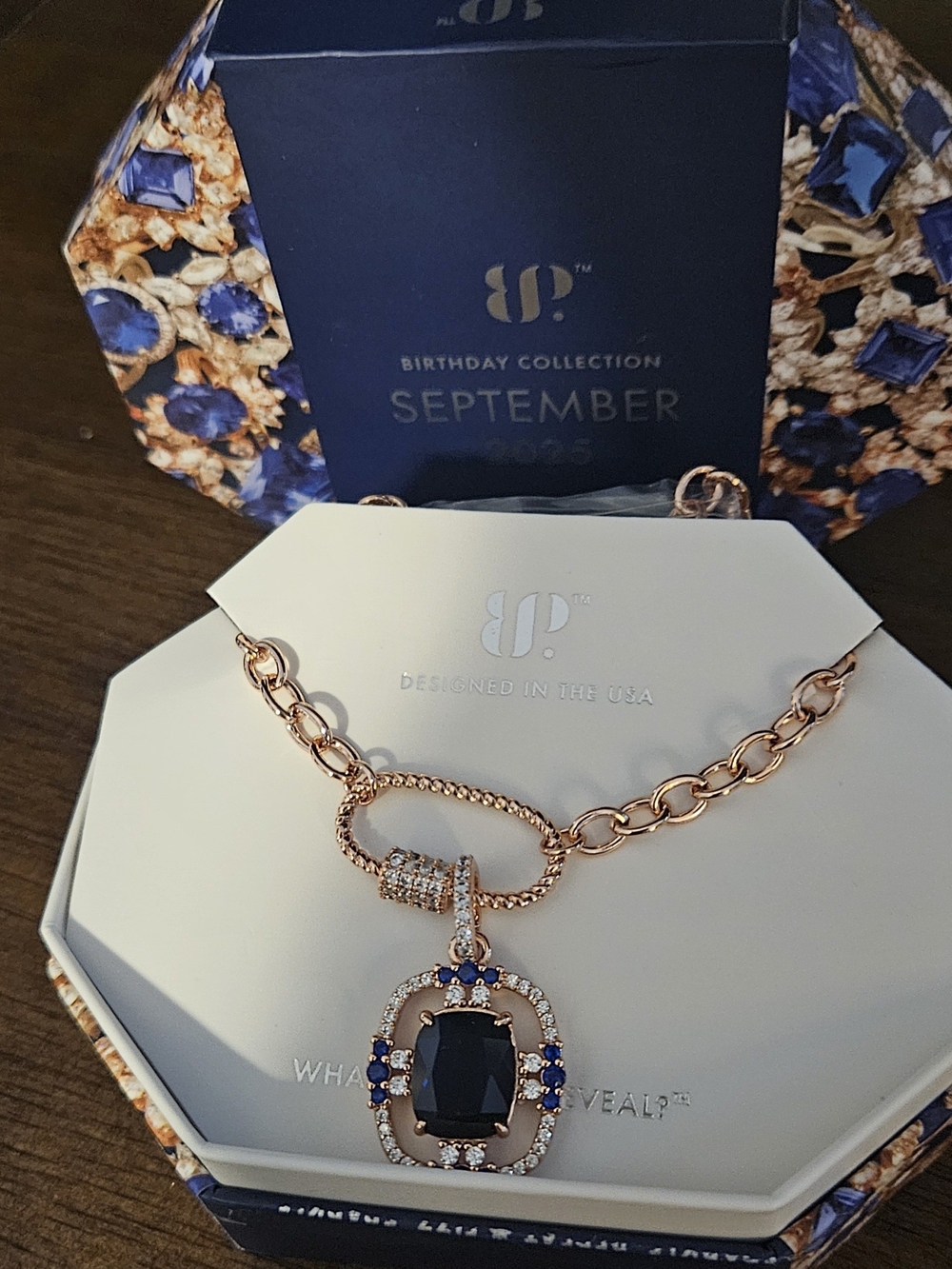 bp Rose Gold Necklace with Deep Blue Pendant and Clear Accents